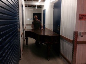 Platinum finishing a Caloundra removals job, by storing a piano.